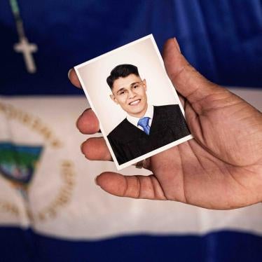 Lesbia Alfaro, mother of student leader Lester Alemán, who went into exile after participating in protests against Nicaraguan President Daniel Ortega's government in 2018, holds a portrait of her son during an interview with AFP in Managua, on September 14, 2021.