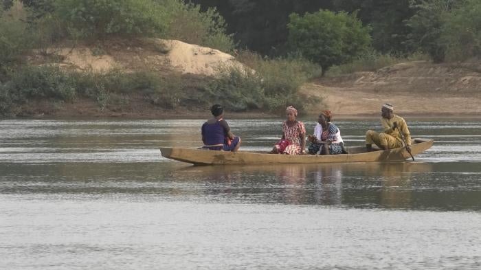 Three people in a canoe