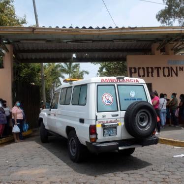  An ambulance enters the Aleman-Nicaraguense Hospital, which cares for people infected with Covid-19, as relatives of patients wait in line in Managua, Nicaragua, on June 1, 2020.