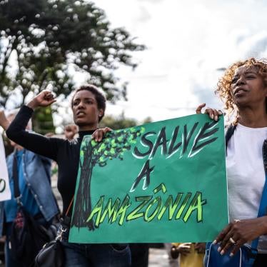 Environmentalists protesting in the streets. 