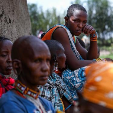 Tanzanian Maasai women evicted from their land in Loliondo sit outside a Maasai manyatta, a traditional house made with branches, mud, and cow-dung, in a village in Narok, Kenya, June 23, 2022.