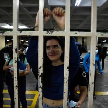 Marcela Blanco (C), a member of the Semilla Party, arrives handcuffed for a hearing at the Palace of Justice after being arrested at her home in Guatemala City on November 16, 2023.