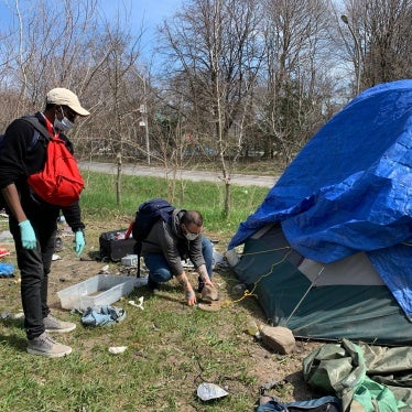 A Gerstein Crisis Centre Mobile Team paying a visit to an encampment for people without homes