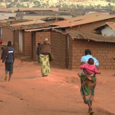 People walk through Dzaleka refugee camp in Dowa district, Central Region, Malawi, on June 20, 2018.