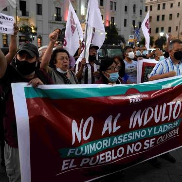 Protesters holding up a banner