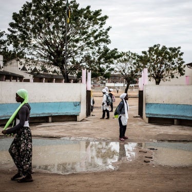 Girls in front of a school building