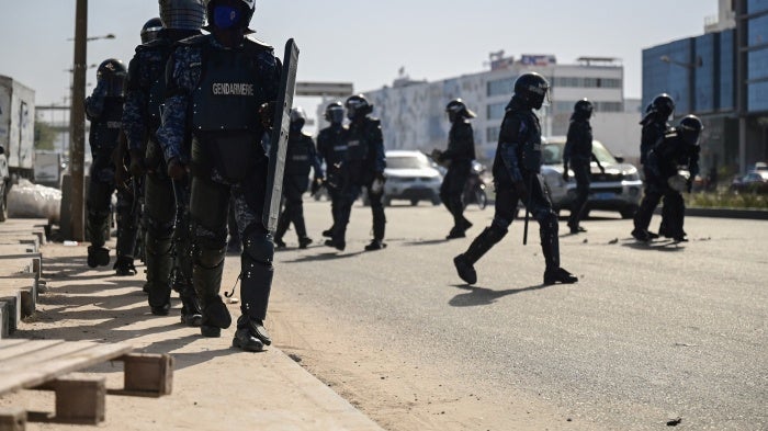 Gendarmes clash with Senegalese demonstrators during a protest against the postponement of the February 25th presidential election, in Dakar, Senegal, February 4, 2024.