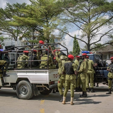 Tanzanian police officers patrol the streets ahead of a demonstration over the alleged kidnapping and killing of opposition party members, Dar es Salaam, September 23, 2024. 