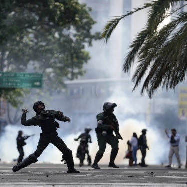 Police hurl a tear gas canister at protesters demonstrating against the announced election results declaring Nicolas Maduro's reelection, the day after the vote, in Caracas, Venezuela, July 29, 2024.