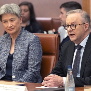 Australia's Minister for Foreign Affairs Penny Wong (L) and Prime Minister Anthony Albanese during a meeting in Parliament House in Canberra, December 7, 2023. 