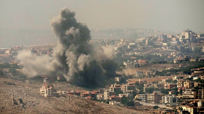 Smoke rises from Israeli airstrikes in the southern village of Kfar Rouman, south Lebanon, September 25, 2024.