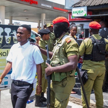 Police detain a supporter of Tanzania’s main opposition party, Chadema, at the start of a banned protest in Dar es Salaam, September 23, 2024.