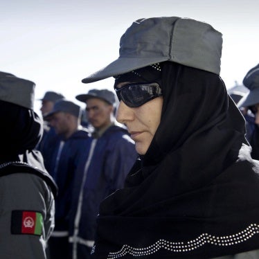 Afghan policewomen and policemen during their graduation ceremony