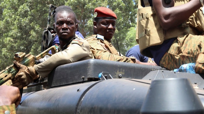 Burkina Faso's president, Capt. Ibrahim Traore (center), in an armored vehicle in Ouagadougou, October 2, 2022.