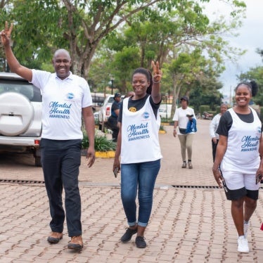 Benon Kabale, left, participates during an event on mental health awareness during the Lubowa Community and Toastmasters Mental Health Run/Walk on November 2, 2024, in Lubowa, Kampala.