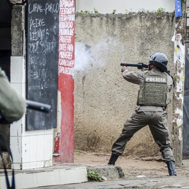 Mozambique police fire on protesters