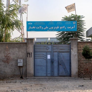 The Taliban flag flies over a National Radio Television of Takhar (RTA) building in Talogan, Afghanistan, on October 15, 2024.