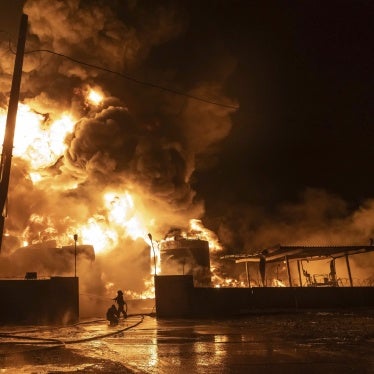 Firefighters extinguish a fire after a Russian attack on a neighborhood in Kharkiv, Ukraine, February 10, 2024.