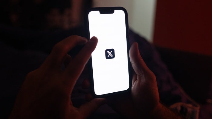 The logo of X, the social media platform formerly known as Twitter, displayed on a smartphone in Sao Paulo, Brazil, August 31, 2024.