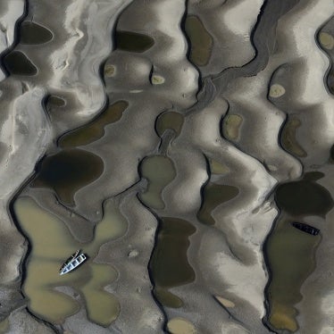 Boats stranded over exposed sandbanksdue to drought at the Solimoes River, one of the largest tributaries of the Amazon River, during the most intense and widespread drought Brazil has experienced since records began in 1950