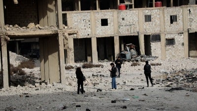 Researchers walking near Damascus grave