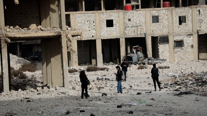 Researchers walking near Damascus grave