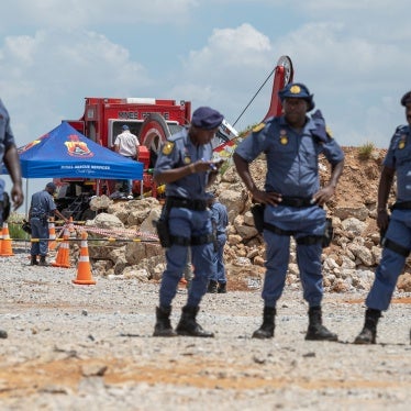 Police maintain a cordon around shaft 11 during rescue operations for trapped miners at the abandoned Buffelsfontein gold mine in Stilfontein, South Africa, January 14, 2025.