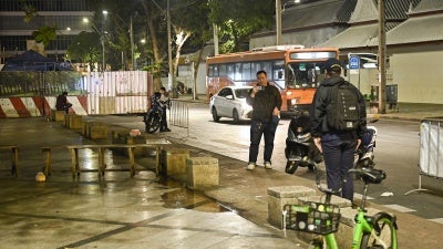 Thai Central Investigation Bureau members stand near the spot where Lim Kimya, a former member of the Cambodian parliament, was shot and killed, in Bangkok, Thailand, on January 7, 2025.