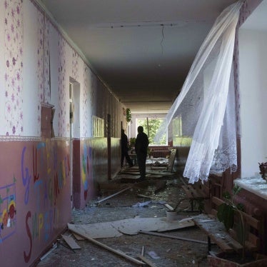  A school guard walks in the corridor of a school which was heavily damaged after a Russian airstrike in Mohrytsia, Ukraine, August 14, 2024.