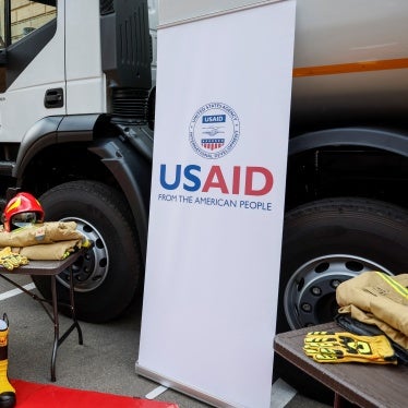 Ukrainian rescuers stand next to the new equipment, which was provided by USAID, in Kyiv, Ukraine, July 17, 2023.