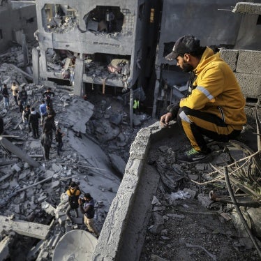 Palestinians inspect the damage after an Israeli strike on the Nuseirat refugee camp in the central Gaza Strip on December 7, 2024.