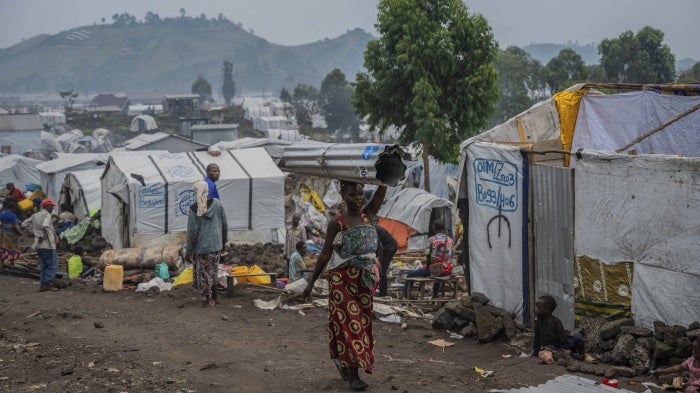 People displaced by the fighting between the M23 armed group and Congolese government forces leave their camp after the M23 ordered their displacement, Goma, Democratic Republic of Congo, February 11, 2025.