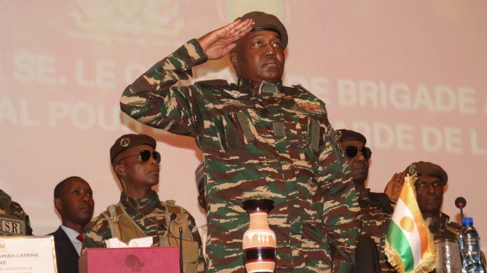 The head of Niger's military junta, Brig. Gen. Abdourahamane Tiani, attends the opening of the commission responsible for conducting the national conference in Niamey, February 15, 2025.