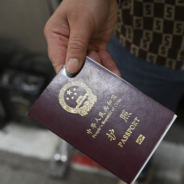 A person holds a Chinese passport