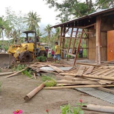 PT Kristus Raja Maumere, a company owned by the Roman Catholic Diocese of Maumere, using excavators to demolish buildings and evict residents on Flores island, Indonesia, January 22, 2025.