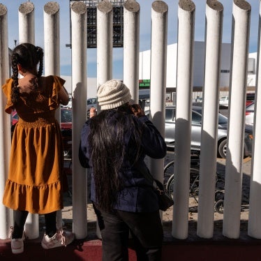 Asylum seekers wait for news on the CBP One appointments at El Chaparral crossing port in Tijuana, Baja California state, Mexico, on January 21, 2025. 